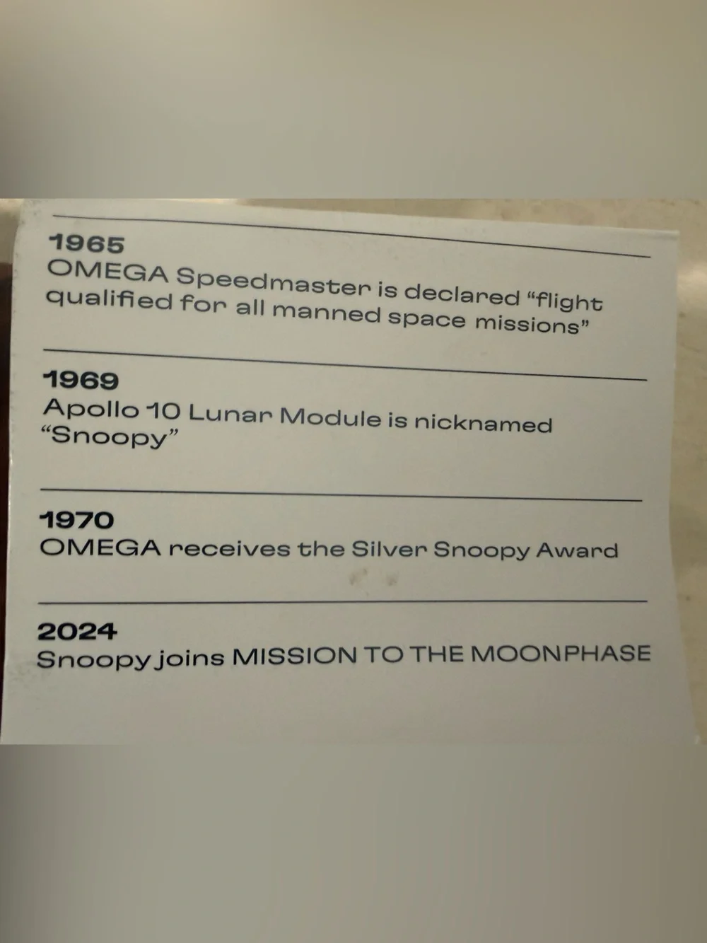 Omega White and Black Text History Card